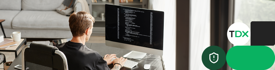 Person coding on a computer in a home office, representing Validating Your Skills