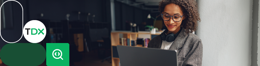 Person working on a laptop with headphones, symbolizing Learn CompTIAⓇ Security+