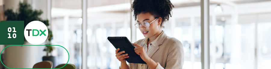 Person holding tablet, icons on left corner.